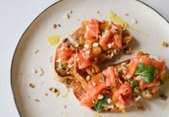 Lightly salted salmon and baked bell peppers bruschetta