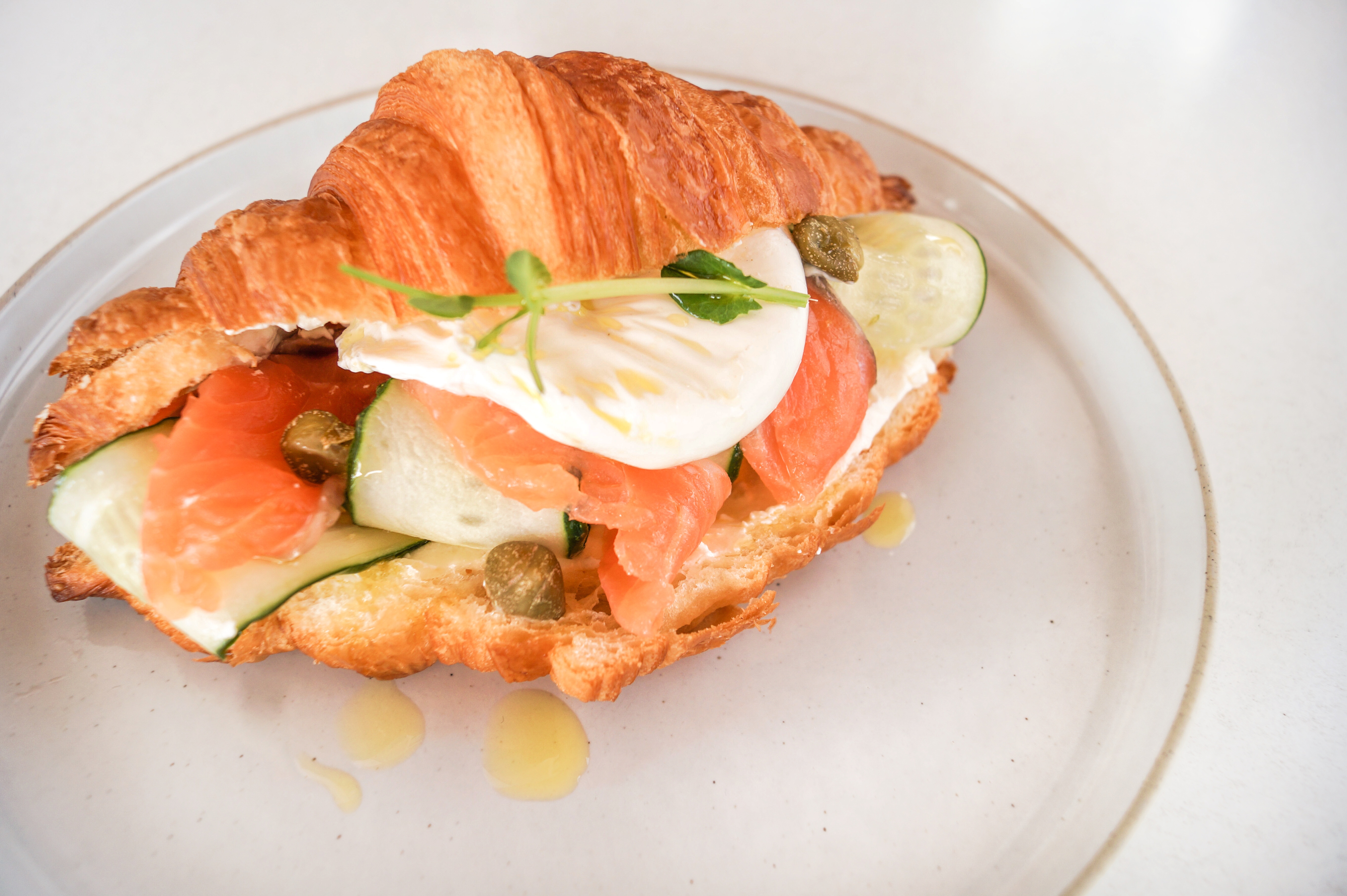 Croissant with  salted salmon, cream cheese and cucumber