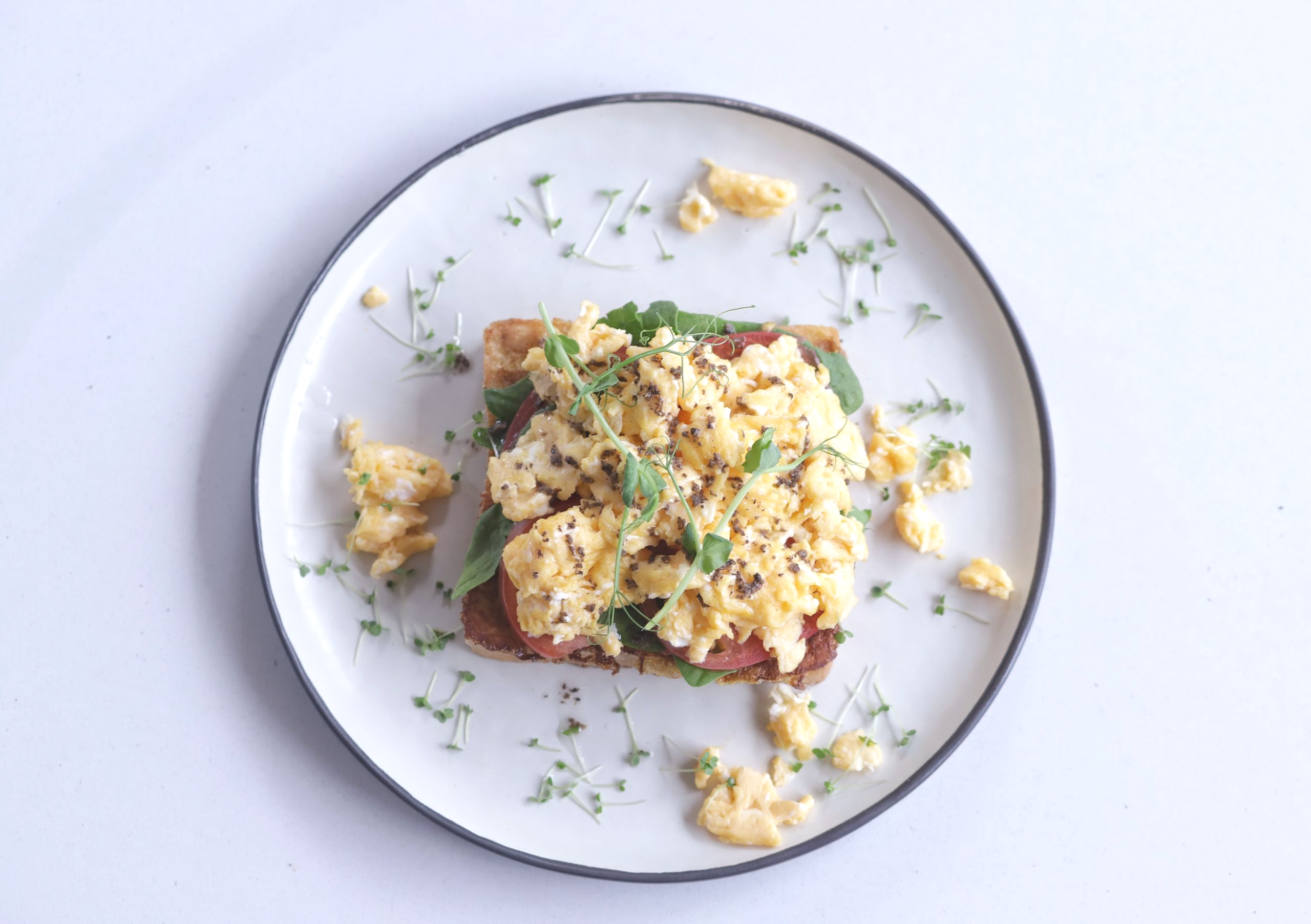<br>NEW! Brioche with truffled scrambled eggs, pink tomatoes and spinach