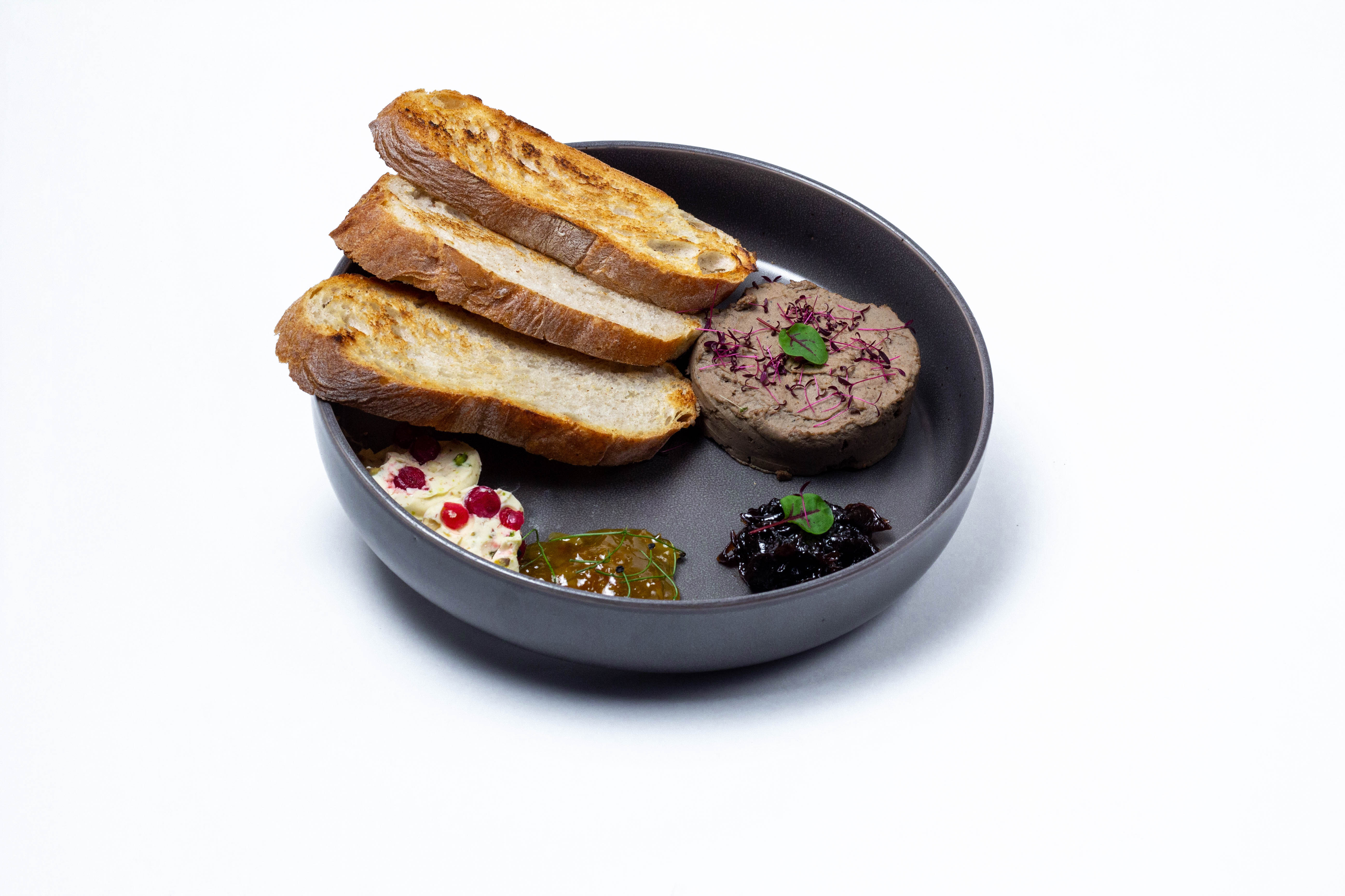 Chicken pate with caramelized onion, orange jam, ciabatta and butter with fresh currants and almonds